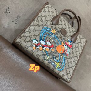 Gucci古驰官方品牌 奢侈GG x Disney Tote 唐老鸭购物袋真假鉴定图648134